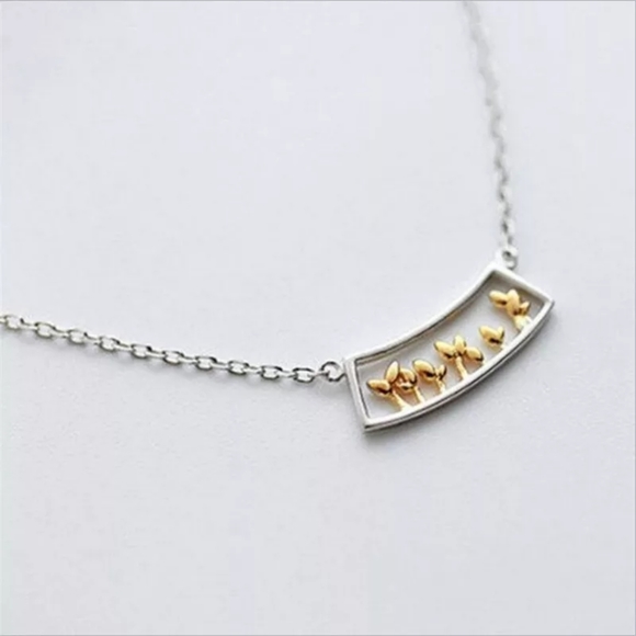 Cute silver and gold plants necklace
